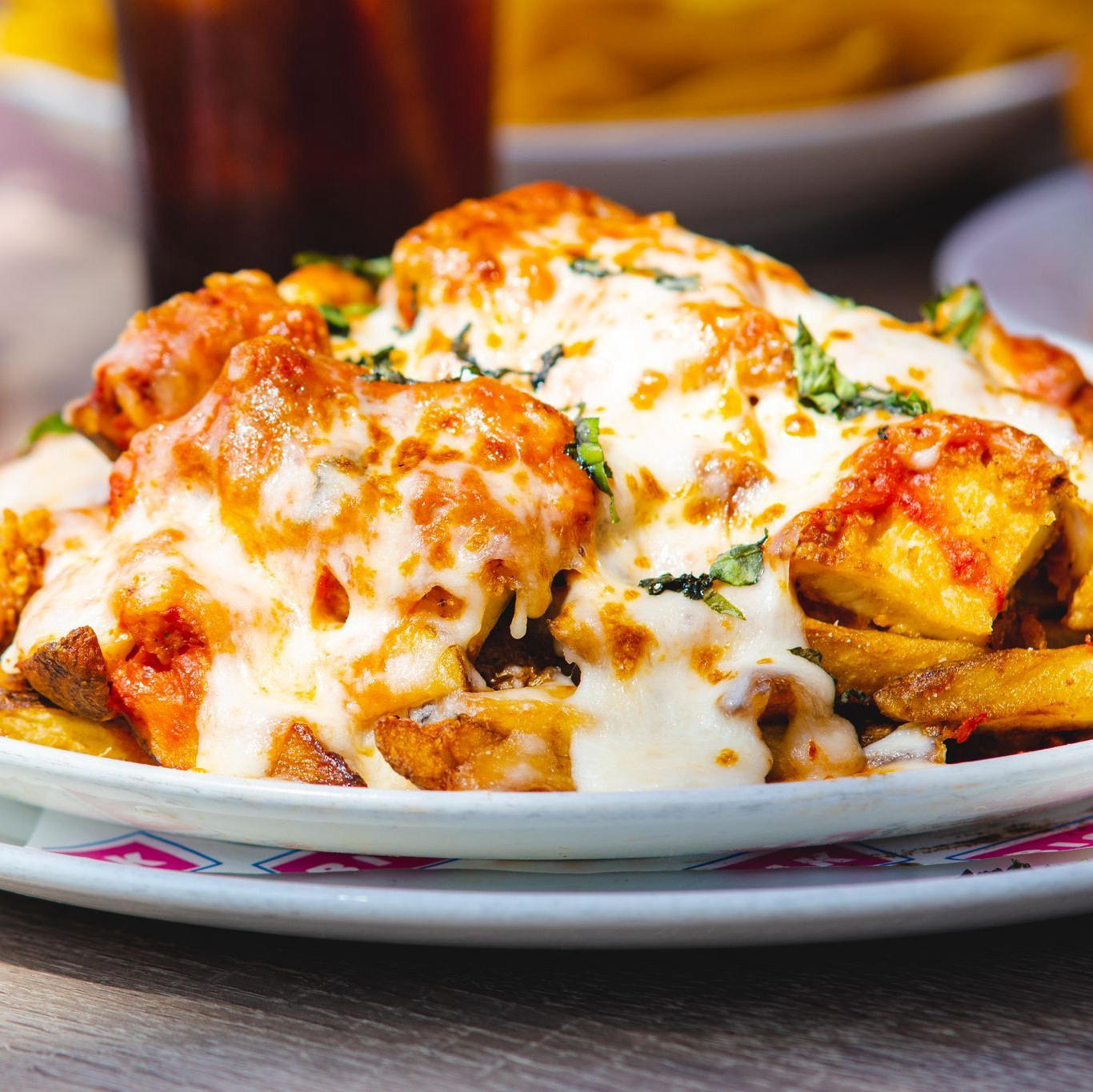Start your week off right with our Chicken Parm Fries #mylesprime112